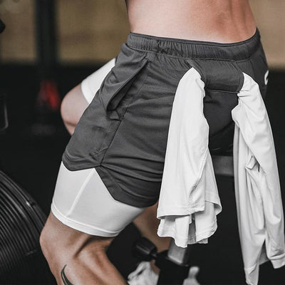 Pantalones cortos deportivos de secado rápido de doble capa